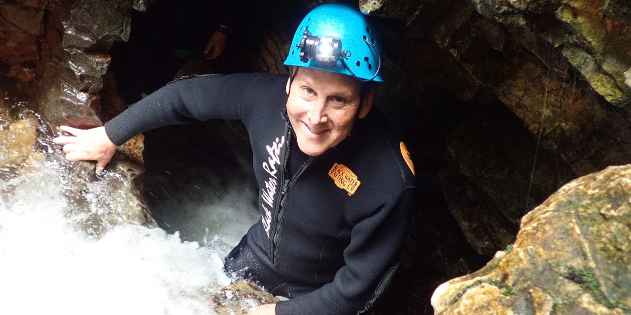 “Drunken Stumble” Through Black Water Rafting Cave